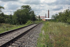 The railroad is in the industrial zone